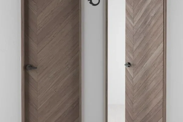 Wooden door frame with laminate finishes and high quality hardware fittings.